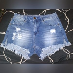 Distressed denim cut off shorts, size M